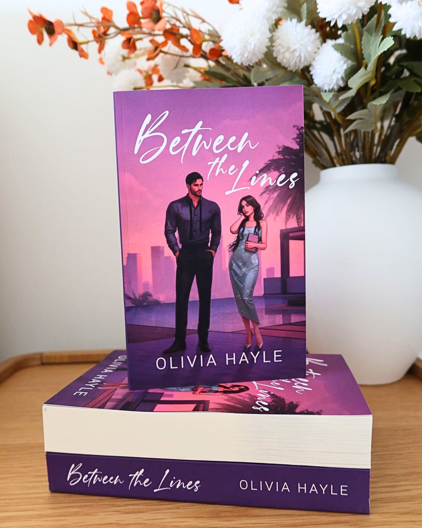Between the Lines (Paperback + SIGNED Bookplate)